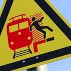 Danger on tracks sign, Don’t trip