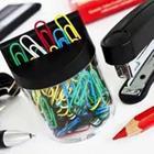 Colored paper clips and stapler