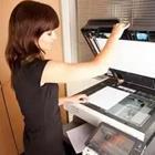Girl using the copy machine