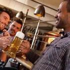 Men drinking beer at a bar