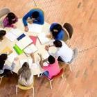People Studying around Circle Table