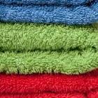 A group of different colored towels