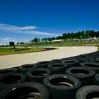 A track with a row of tires next to each other