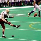 A football player kicking a ball