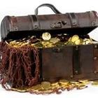 Treasure chest with gold inside of it