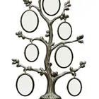 A picture frame in the shape of tree with ovals hanging off the side of it