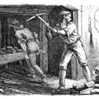 A black and white drawing of a man chopping at a wall
