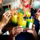 A bunch of people with colorful drinks in their hands