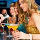 Girls drinking martinis at the bar
