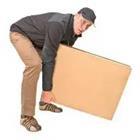 Man picking up cardboard box