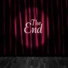The End on a stage in front of curtains
