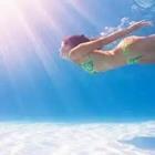 Girl swimming underwater