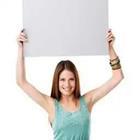 Girl holding up paper
