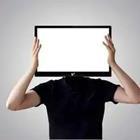 Man holding white computer screen