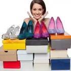 Shoe collection, woman with shoe boxes