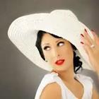 Woman in white hat
