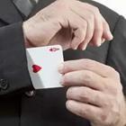 A person pulling a card out of their sleeve