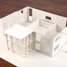 A white 3-D outline of the inside of a house