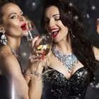 Women celebrating drinking white wine