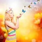 Girl blowing butterflies