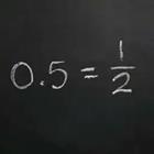 A math problem on a black chalkboard