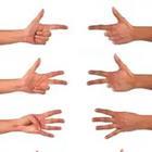 Six hands sticking out with different fingers pointing