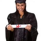 A woman holding out her diploma