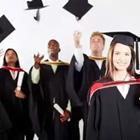 Graduates throwing up their caps