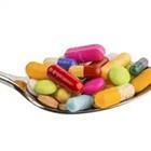 A bunch of pills in a spoon