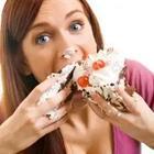 A person stuffing their face with food