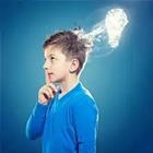 A child with his hand on his chin and a light attached to his head