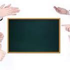 Chalk board and clapping hands