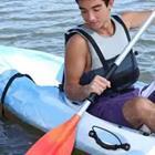 A person riding in kayak