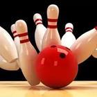A red bowling ball hitting a bunch of white pins