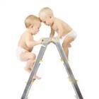 Two babies on a ladder
