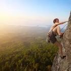 Person rock climbing a cliff