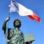 French flag and statue