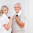 Old elderly couple working out