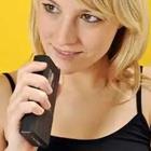 Blonde girl with voice recorder