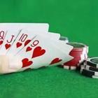 Hand of cards red hearts